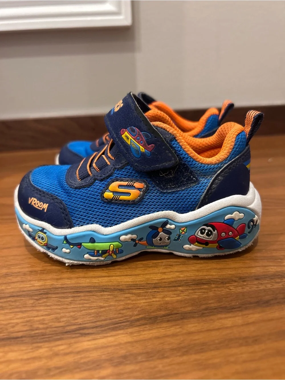 Skechers Kids Blue and Orange Airplane sneakers